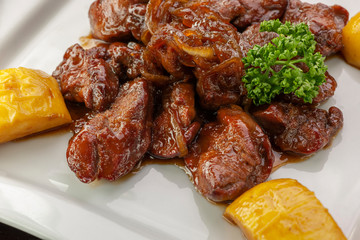  This is a second course of baked meat and potatoes.