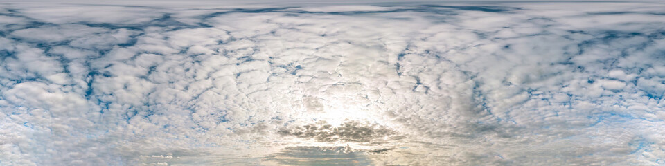 blue sky with beautiful cumulus clouds. Seamless hdri panorama 360 degrees angle view with zenith for use in 3d graphics or game development as sky dome or edit drone shot