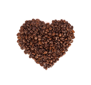 Heart shape of roasted coffee beans isolated on a white background.