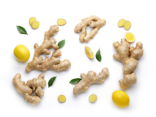 Fresh ginger and lemon on white background