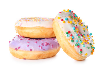 Sweet tasty donuts on white background