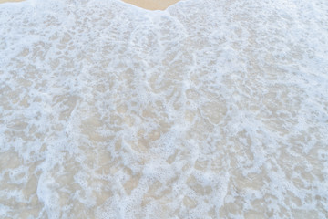 Background, bright brown sea sand, comfortable to the eyes, Phuket, Thailand.