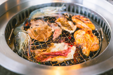 Yakiniku Buffet with Seafood Charcoal Grill BBQ Food style closeup.