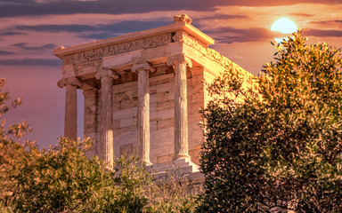 Fototapeta na wymiar Athena Nike (victory) ancient temple under dramatic sky, Athens Greece
