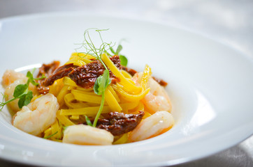 delicious italian pasta with fresh shrimps & dried tomatoes