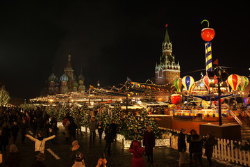 Christmas Fair on Red Square. Christmas celebrations in Moscow, Russia. Moscow Kremlin in  winter holidays