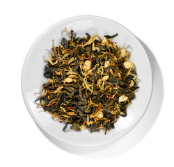 Green tea with aromatic additives. Top view on white background