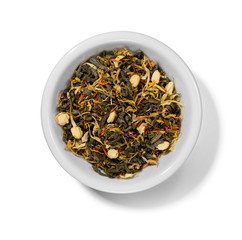 Green tea with aromatic additives. Top view on white background