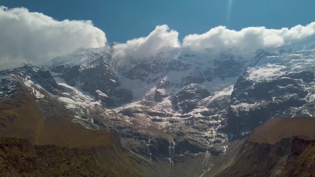 Humantay Lagoon with snow on Andes Mountains at Salkantay, Cusco region, Peru