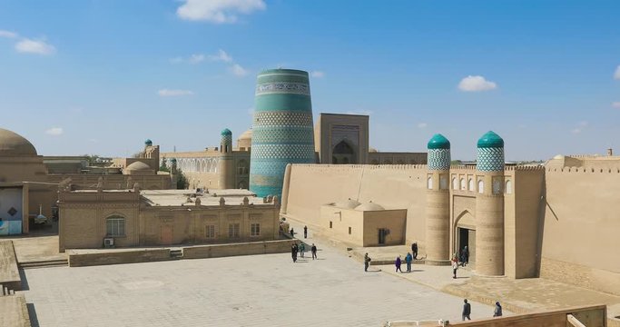 Zoom in view of Gate of Kunya-Ark citadel and Kalta Minor minaret in Khiva, Khorezm Region, Uzbekistan