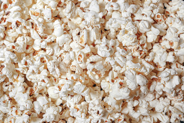 Scattered salty crispy fresh popcorn, texture background