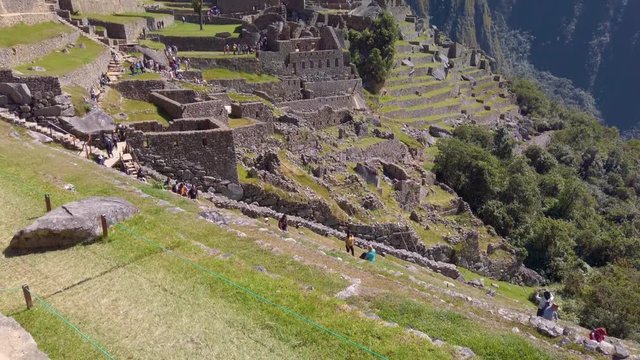 Main place of archaeological citadel of Machu Picchu and cultivation terraces. Views of the Andes mountains and Huayna Picchu as background. Cusco region, Peru