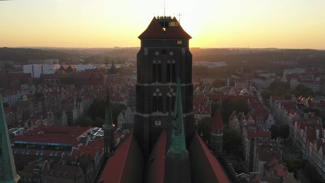 Gdansk old city in the rays of the rising sun, aerial view of the old city streets