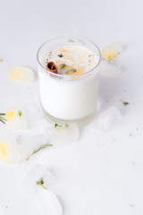 Lassi is an Indian traditional, milk drink next to ice.