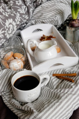 flat lay in scandinavian style. Coffee and breakfast in bed.
