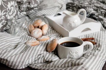 Fototapeta na wymiar flat lay in scandinavian style. Coffee and breakfast in bed.