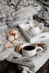 flat lay in scandinavian style. Coffee and breakfast in bed.