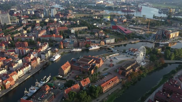 Gdansk old city in the rays of the rising sun, aerial view of the old city streets