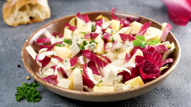 chicory salad with blue cheese, apple and herbs