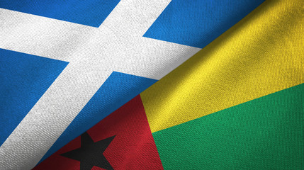 Scotland and Guinea-Bissau two flags textile cloth, fabric texture