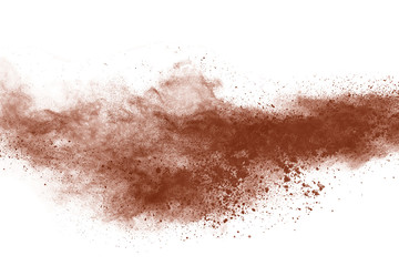 Brown color powder explosion on white background. 