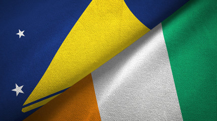 Tokelau and Cote d'Ivoire Ivory coast two flags textile fabric texture