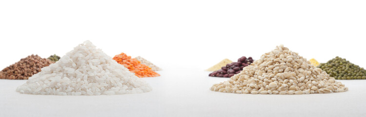 Heaps of rice and pearl barley on a background of thematically similar heaps