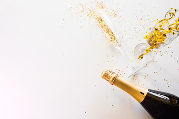 happy new year concept champagne and glasses on a white background with place for text © itakdalee