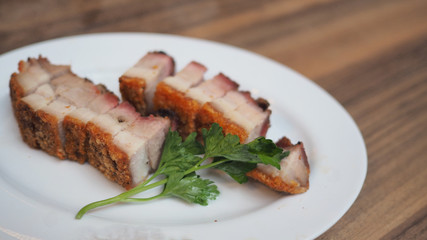 Roast Pork Belly on white plate.