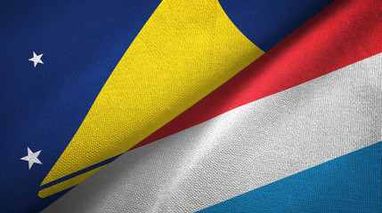 Tokelau and Luxembourg two flags textile cloth, fabric texture