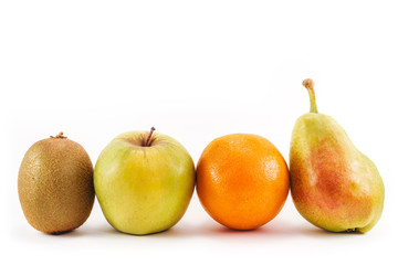 Group of fresh fruits isolated on white background. Kiwi, apple, orange and pear. Vegetarian, vegan, organic, bio and detox food. Concepts of nutrition, dietetics, health care and wellness