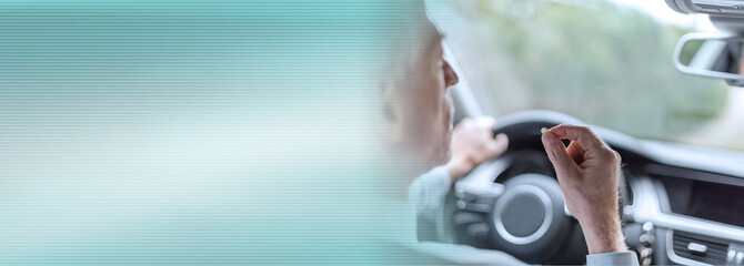 Man taking drugs while driving; panoramic banner