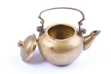 Ancient teapot on white background