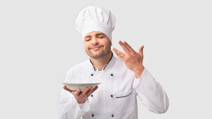 Chef Man Holding Plate Smelling Dish Over White Background, Panorama