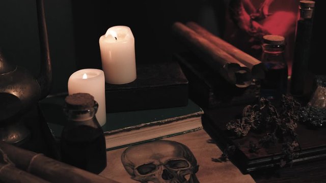 Recreation of alchemy altar with occult and wichcraft artifacts and relics. Right trucking camera motion.