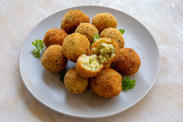 Deep Fried Risotto Balls with herbs