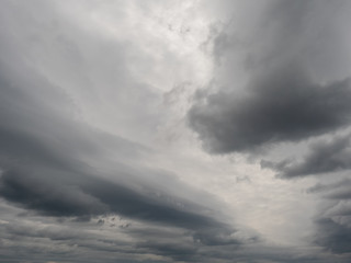 Obraz premium Dramatic dark storm sly clouds abstract background.