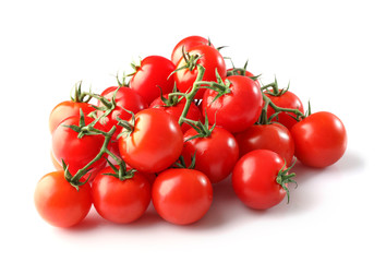Group of ripe red cherry tomatos isolated on white background