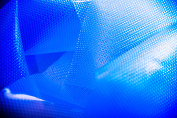 Naklejka premium Plastic in blue color. Environmental protection. Utilization of wastes.
