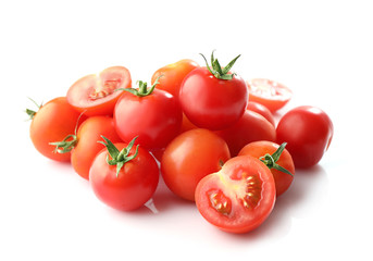 Ripe red cherry tomatos isolated on white background