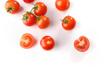 Red ripe cherry tomatoes on white background. Top view