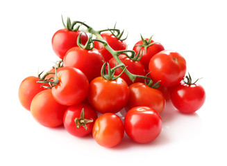 Branches of red ripe tomatoes isolated on white background