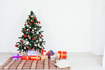 Christmas home decor with Christmas tree and gifts new year holidays