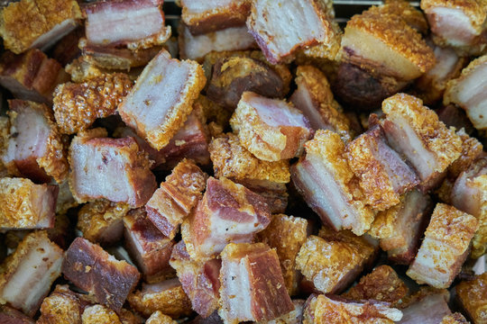 Torreznos dish cut into pieces and ready to eat. Torreznos are a typical meal from Soria, Spain, consisting of fried pork bacon.