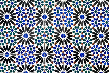 Wall with traditional Portuguese decor tiles azulezhu in colorful tones.