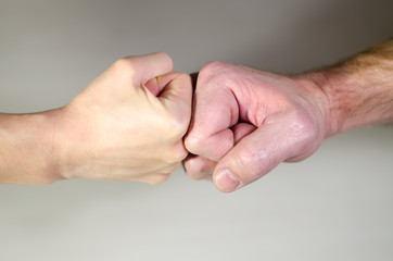 Man and woman shake hands. Gender equality