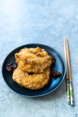 Fried Pineapple Fritters Caramelized with Cinnamon and Sesame Seeds.