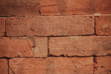 Old grunge red brick wall background texture