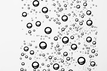 white isolated background water drops on the glass / wet window glass with splashes and drops of water and lime, texture autumn background