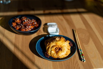Fried Pineapple Fritters Caramelized with Cinnamon and Sesame Seeds.